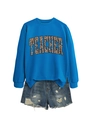 Blue sweatshirt with leopard print TEACHER text paired with distressed denim shorts - S / Lake Blue