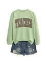 Close-up of light green leopard print teacher sweatshirt with distressed denim shorts - Olive Green