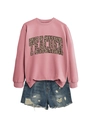 Flat lay of pink crewneck teacher sweatshirt with leopard print text and denim shorts - Rose Gold