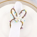 Handmade woven rabbit ear napkin ring with colorful berries and white flower on a plate - Rabbit Ear Napkin Ring