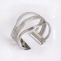 Modern silver multi-layered woven open napkin ring with metallic mesh bands and buckle - Silver Metal Woven Open Napkin Ring