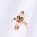 Detail eines Nussknacker-Serviettenrings mit Goldfinish und bunter Emaille-Beschichtung - Silberne Basis Rot-Weißer Stil (Stil 4)