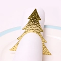 Golden Christmas tree napkin ring with hammered texture on white napkin and plate - Gold Hollow Christmas Tree Style