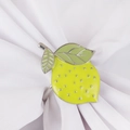 Bright yellow lemon napkin ring with green leaves on white fabric background - Silver Ring Yellow Lemon Style