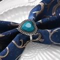 Silver napkin ring with turquoise heart and rhinestone accents for elegant table settings - Heart Rhinestone Style / Silver