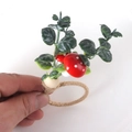 Detail of forest style napkin ring with faux leaves, red mushrooms and jute rope - Mushroom Leaf Style