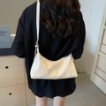 Retro cream white oil-waxed leather crossbody bag with adjustable strap and pleated texture - Off White