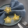 Rond de serviette floral doré avec perle et strass sur tissu bleu élégant - Doré