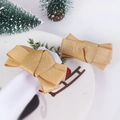 Set of two festive champagne gold fabric bow napkin rings for Christmas table decor - Gold Bowknot Style