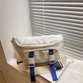 White sporty crossbody bag with blue contrast straps and adjustable wide shoulder strap - White