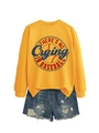 Flat lay of yellow long-sleeve sweatshirt with baseball slogan and denim shorts - Yellow