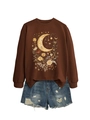 Detail of dark brown sweatshirt with moon floral print paired with frayed denim shorts - Coffee