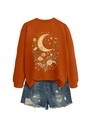 Detail of caramel orange sweatshirt with moon floral print and ripped denim shorts - Burnt Orange
