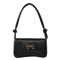 Elegante borsa a tracolla nera con fiocco dorato e finitura in ecopelle liscia - Nero