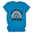 Detail of bright blue crew neck t-shirt with rainbow print and humorous text design - S / Tops / Lake Blue (Black Text)