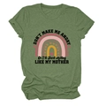 Detail of green cotton t-shirt fabric showing rainbow print and smooth knit texture - S / Tops / Olive Green (Black Text)