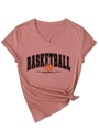 Detail of V-neck brick red t-shirt with Basketball Mom print and knotted hem design - Rose Gold (Black Graphic)