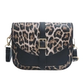 Fashionable leopard print saddle bag with black leather trim and gold buckle closure - Black