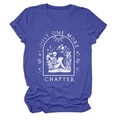 Close-up of blue cotton T-shirt featuring vintage Just One More Chapter graphic print - Retro Blue (White Text)