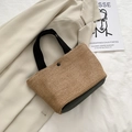 Straw woven tote bag with black strap contrast and metal buckle for summer beach vacation - Black