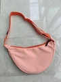 Pink nylon crescent crossbody bag with adjustable wide strap and minimalist design - Orange Pink