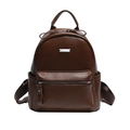 Women soft leather backpack in dark brown with litchi texture and silver logo plate - Brown