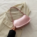 Pink patent leather underarm bag with crescent shape and glossy finish - Pink