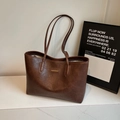Large dark brown tote bag with leather texture and thin shoulder straps for women - Coffee