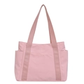 Minimalist pink nylon tote bag with functional side pockets and wide shoulder straps - Pink