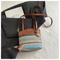 Colorful woven bucket bag with brown leather handles and adjustable shoulder strap - Small Brown