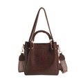 Dark brown leather bucket bag with decorative jacquard strap and minimalist branding - Brown