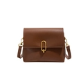 Vintage dark brown leather crossbody bag with elegant oval gold buckle on white background - Brown