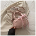 Pink matte faux leather handbag featuring lace bows and detachable shoulder strap - Pink With Pendant