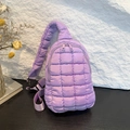 Quilted nylon crossbody bag in lavender purple with adjustable padded strap and zipper pockets - Purple