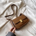 Vintage brown leather crossbody bag with golden textured twist-lock and slim strap - Brown
