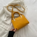 Fashionable bright yellow crocodile pattern square handbag with woven handle and gold accents - Yellow