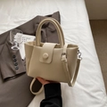 Minimalist cream white tote bag in lychee pattern leather with round handles and strap - Off White