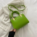 Elegant bright green mini tote bag with crocodile texture and woven handle crossbody strap - Kiwi Green