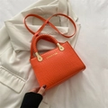 Bright orange crocodile pattern tote bag with woven handle and gold hardware detail - Orange