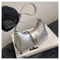 Detail of silver metallic hobo bag featuring cracked leather texture and metal buckle strap - Silver