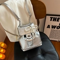 Silver metallic backpack with chain detail and pearl butterfly charm on black seat - With Pearls / Silver