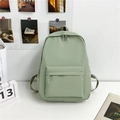 Minimalist sage green nylon backpack with large capacity for students and travel - Green
