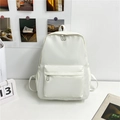 Minimalist white nylon backpack for students featuring front zipper pocket and clean design - White
