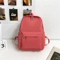 Lightweight coral pink nylon backpack for students featuring large capacity and sleek zips - Watermelon red