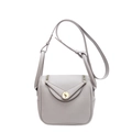 Sac seau chic en cuir violet clair avec détails dorés et bandoulière réglable - Gris