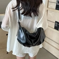 Black crescent tote bag in glossy embossed leather with adjustable shoulder strap - Black