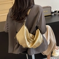 Golden embossed large hobo bag with metallic texture and wide shoulder strap - Gold