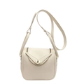Sac seau chic en cuir beige avec fermetures éclair et verrou doré élégant - Blanc Cassé