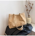 Close-up of khaki soft tote bag with golden chain strap and vintage suede texture details - Khaki