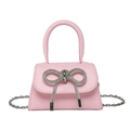 Pink PU leather crossbody bag featuring a sparkling silver rhinestone bow and chain strap - Pink